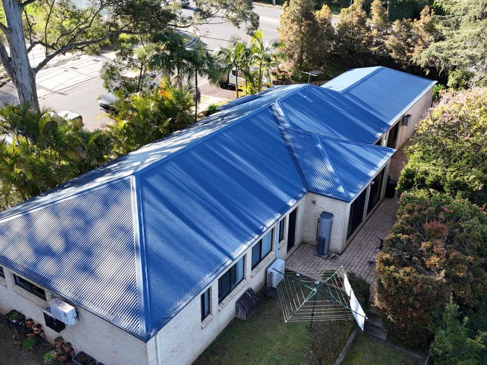 Blue Colorbond roof on a Sydney home, seen from above